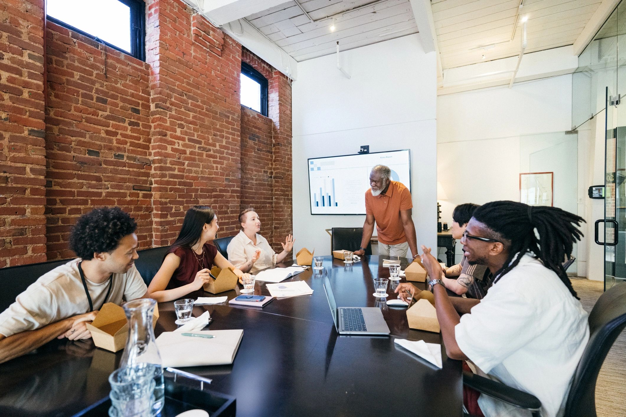 Corporate team collaborating in a boardroom during a strategic planning session